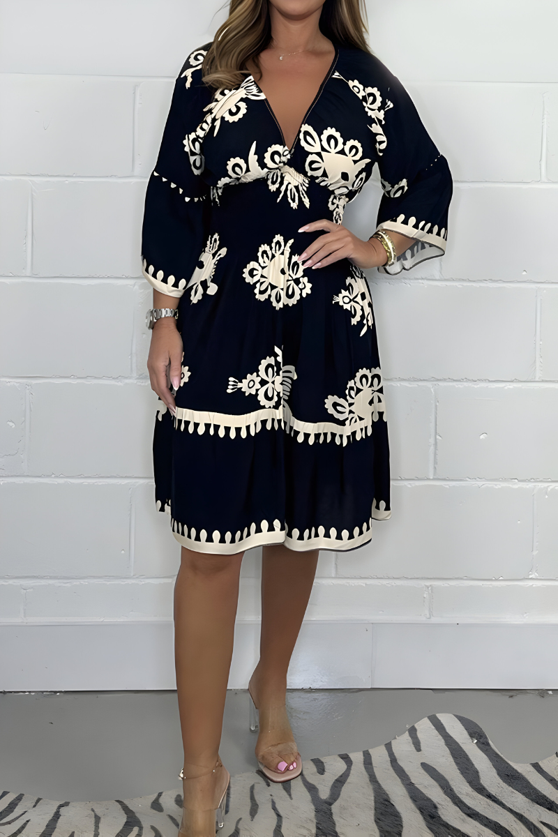 Elegante jurk met patroon en V-hals – perfect voor elke gelegenheid