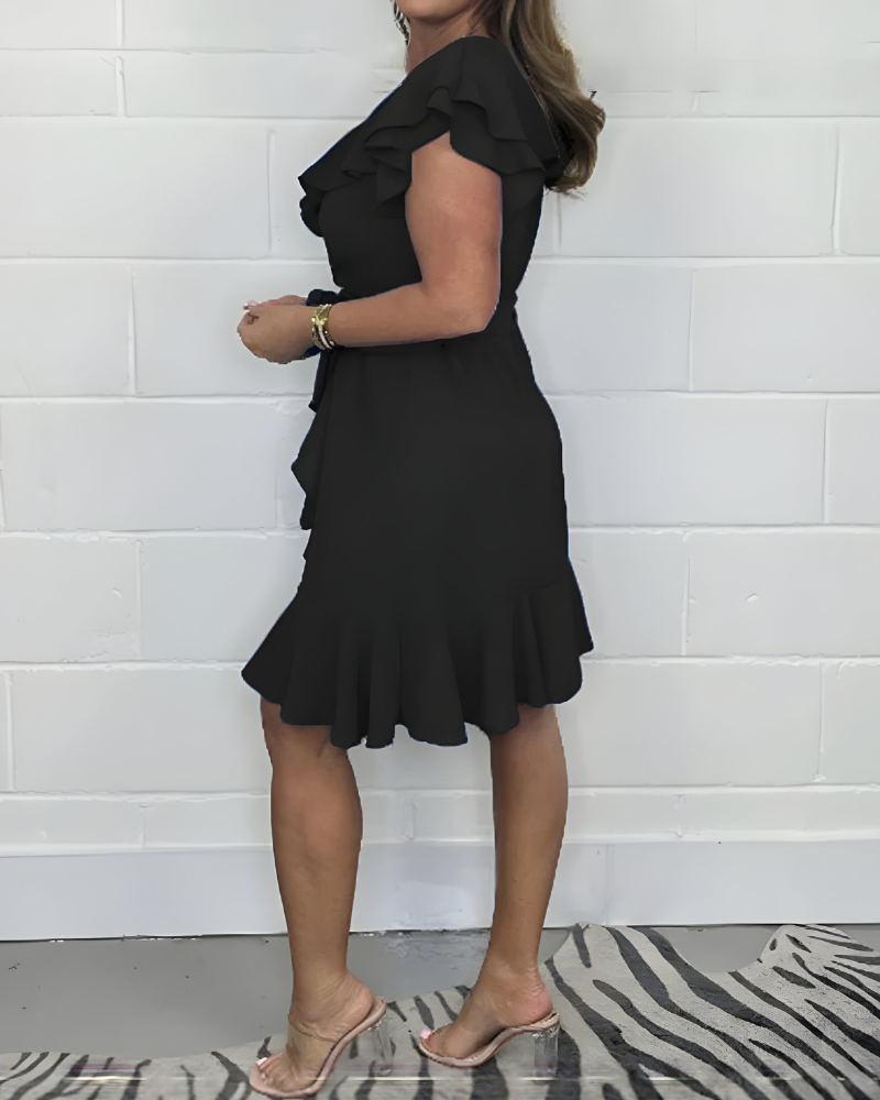 Elegante Rimpeljurk met V-hals – vrouwelijke look voor elke gelegenheid
