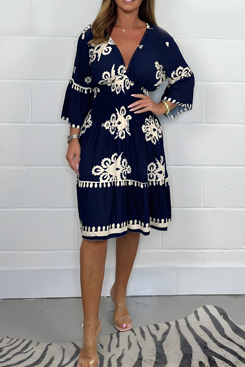 Elegante jurk met patroon en V-hals – perfect voor elke gelegenheid
