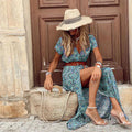 Maxi-jurk met paisleypatroon, tailleband en hoge split