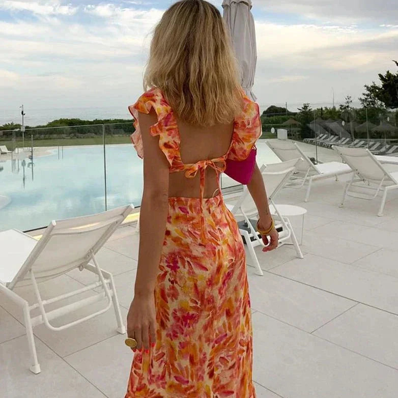 Maxi-jurk met ruches en bloemenpatroon – stijlvolle zomerse look met een vrouwelijke touch